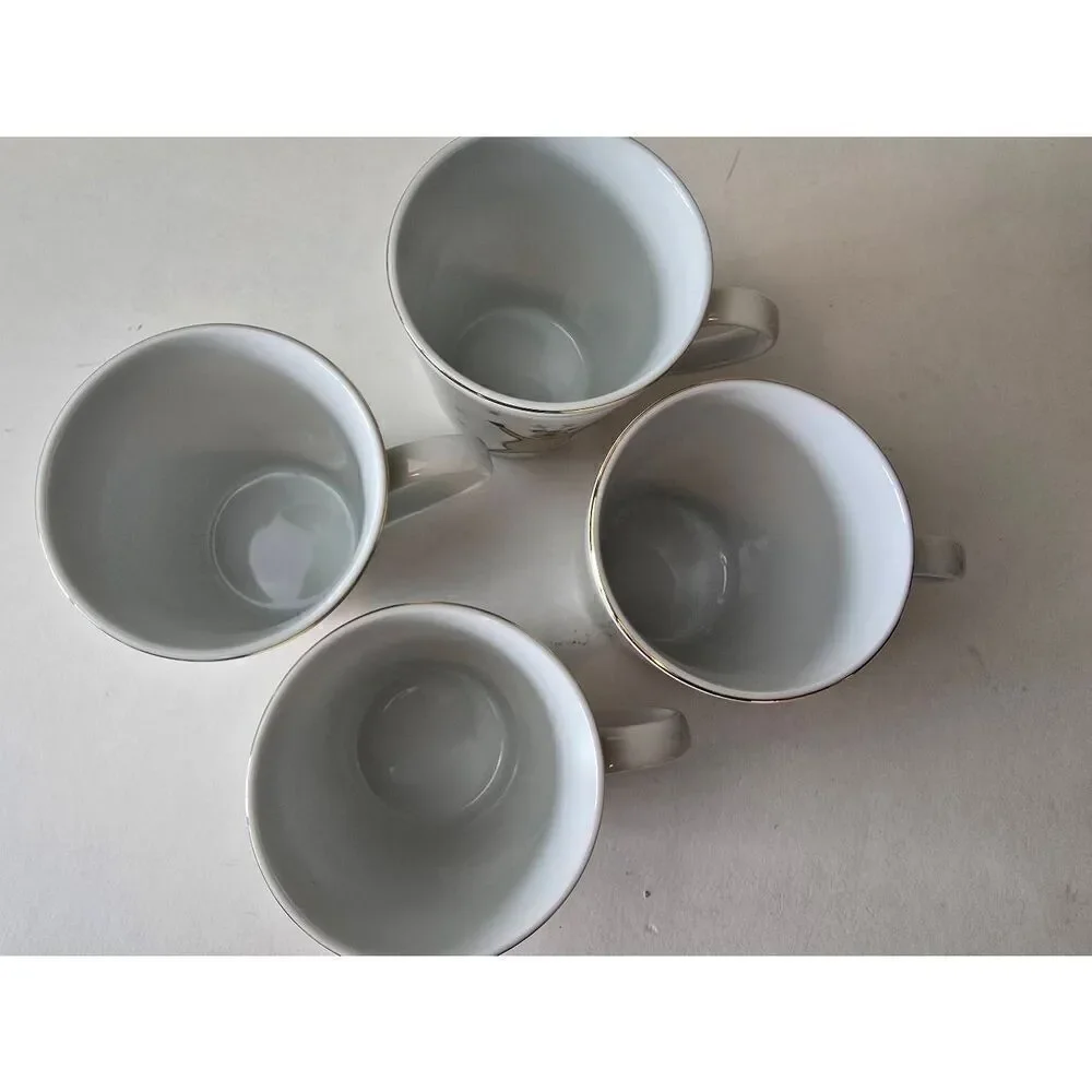 Merry Brite Set of four cups Christmas theme